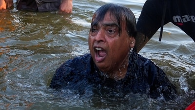 Mukesh Ambani takes a ritualistic holy dip at Sangam. The family participated in the Vishwa Shanti Yagya, praying for "global peace and welfare," a release by the company said. (AP) Mukesh Ambani takes a ritualistic holy dip at Sangam. The family participated in the Vishwa Shanti Yagya, praying for "global peace and welfare," a release by the company said. (AP)