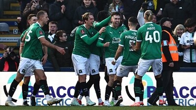 Plymouth's players celebrate (AFP)
