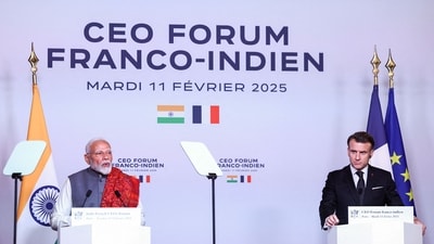 Indian Prime Minister Narendra Modi (L) delivers a speech next to French President Emmanuel Macron during the closing session of the Franco-Indian Economic Forum at the Quai d'Orsay following the Artificial Intelligence (AI) Action Summit in Paris, on February 11, 2025. (Photo by Abdul Saboor / POOL / AFP) (AFP) Indian Prime Minister Narendra Modi (L) delivers a speech next to French President Emmanuel Macron during the closing session of the Franco-Indian Economic Forum at the Quai d'Orsay following the Artificial Intelligence (AI) Action Summit in Paris, on February 11, 2025. (Photo by Abdul Saboor / POOL / AFP) (AFP)