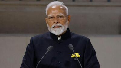 Indian Prime Minister Narendra Modi stands on stage during his address at the plenary session at the Artificial Intelligence (AI) Action Summit, at the Grand Palais, in Paris, on Tuesday. (AFP) Indian Prime Minister Narendra Modi stands on stage during his address at the plenary session at the Artificial Intelligence (AI) Action Summit, at the Grand Palais, in Paris, on Tuesday. (AFP)