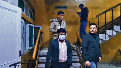 Mandi SDM Om Kant Thakur (wearing mask) at the civil hospital after the attack on Monday. (HT Photo) Mandi SDM Om Kant Thakur (wearing mask) at the civil hospital after the attack on Monday. (HT Photo)