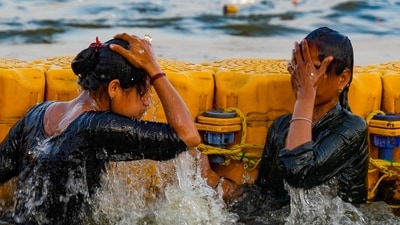 Devotees take a holy dip during the ongoing Maha Kumbh Mela in Prayagraj, Uttar Pradesh (PTI) Devotees take a holy dip during the ongoing Maha Kumbh Mela in Prayagraj, Uttar Pradesh (PTI)
