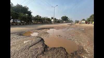Potholes on the main road in Sector 90 cause accidents in Gurugram. (HT PHOTO) Potholes on the main road in Sector 90 cause accidents in Gurugram. (HT PHOTO)