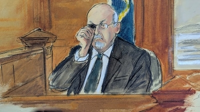 In this courtroom sketch, Salman Rushdie testifies on the witness stand, during the trial of Hadi Matar, Tuesday, Feb. 11, 2025 in Mayville, N.Y. showing how he was stabbed in the eye, when he was attacked in 2022. (Elizabeth Williams via AP) (AP) In this courtroom sketch, Salman Rushdie testifies on the witness stand, during the trial of Hadi Matar, Tuesday, Feb. 11, 2025 in Mayville, N.Y. showing how he was stabbed in the eye, when he was attacked in 2022. (Elizabeth Williams via AP) (AP)