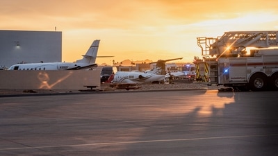 Emergency crews respond after a midsize business jet skidded off the runway while landing and collided with another jet that was parked at the municipal airport in Scottsdale, Arizona, U.S. February 10, 2025.  REUTERS/Thomas Machowicz (REUTERS)