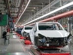 File photo: Cars on the assembly line during a tour of the Tesla Giga Texas manufacturing facility in Austin, Texas.(AFP)