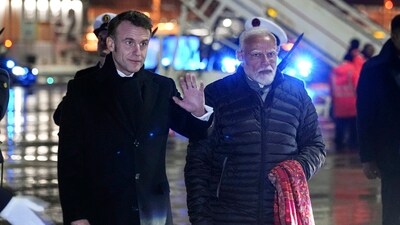 French President Emanuel (left) and Prime Minister Narendra Modi arrive at Marseille Provence airport in Marignane, southern France, on Tuesday. (AP) French President Emanuel (left) and Prime Minister Narendra Modi arrive at Marseille Provence airport in Marignane, southern France, on Tuesday. (AP)