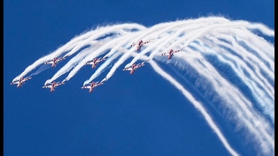 Bengaluru: Indian Air Force aerobatic team 'Surya Kiran' performs aerobatic maneuvers during the Aero India 2025, at the Yelahanka Air Force Station in Bengaluru, Karnataka, Wednesday, Feb. 12, 2025. (PTI Photo/Shailendra Bhojak) (PTI02_12_2025_000364B) (PTI) Bengaluru: Indian Air Force aerobatic team 'Surya Kiran' performs aerobatic maneuvers during the Aero India 2025, at the Yelahanka Air Force Station in Bengaluru, Karnataka, Wednesday, Feb. 12, 2025. (PTI Photo/Shailendra Bhojak) (PTI02_12_2025_000364B) (PTI)
