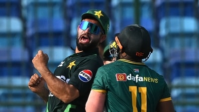 Pakistan's Kamran Ghulam celebrates after the dismissal of South Africa's captain Temba Bavuma (R) during the Tri-Nation series third one-day international (ODI) cricket match between Pakistan and South Africa at the National Stadium in Karachi on February 12 (AFP) Pakistan's Kamran Ghulam celebrates after the dismissal of South Africa's captain Temba Bavuma (R) during the Tri-Nation series third one-day international (ODI) cricket match between Pakistan and South Africa at the National Stadium in Karachi on February 12 (AFP)
