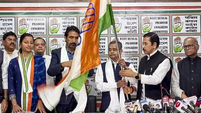 Congress general secretary Ghulam Ahmed Mir, who is in charge of the party’s Bengal unit, gave Abhijit Mukherjee a membership of the Congress at the party headquarters in Kolkata in the presence of state leaders. (PTI) Congress general secretary Ghulam Ahmed Mir, who is in charge of the party’s Bengal unit, gave Abhijit Mukherjee a membership of the Congress at the party headquarters in Kolkata in the presence of state leaders. (PTI)