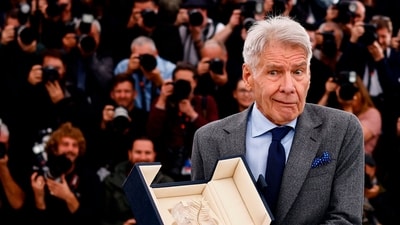 The 76th Cannes Film Festival - Photocall for the film "Indiana Jones and the Dial of Destiny" (Indiana Jones et le cadran de la destinee) Out of Competition - Cannes, France, May 19, 2023. Cast member Harrison Ford holds his Honorary Palme d'Or Award. REUTERS/Yara Nardi (REUTERS)