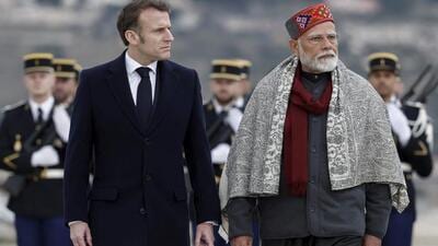 French President Emmanuel Macron, left, and Indian Prime Minister Narendra Modi attend a departure ceremony at Marseille Provence airport in Marignane as part of a visit in Marseille, on Feb. 12. (AP) French President Emmanuel Macron, left, and Indian Prime Minister Narendra Modi attend a departure ceremony at Marseille Provence airport in Marignane as part of a visit in Marseille, on Feb. 12. (AP)