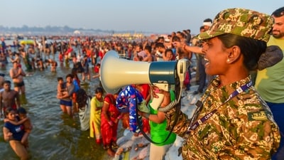 A security personnel makes announcements to manage the crowd of devotees at the Sangam area on the occasion of ‘Maghi Purnima’. (PTI) A security personnel makes announcements to manage the crowd of devotees at the Sangam area on the occasion of ‘Maghi Purnima’. (PTI)