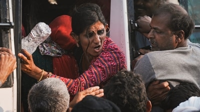 Passengers jostle to board a bus at Bank Road amid a massive rush on 'Maghi Purnima', during the Maha Kumbh Mela 2025, in Prayagraj, Uttar Pradesh, Wednesday, Feb. 12, 2025. (PTI) Passengers jostle to board a bus at Bank Road amid a massive rush on 'Maghi Purnima', during the Maha Kumbh Mela 2025, in Prayagraj, Uttar Pradesh, Wednesday, Feb. 12, 2025. (PTI)