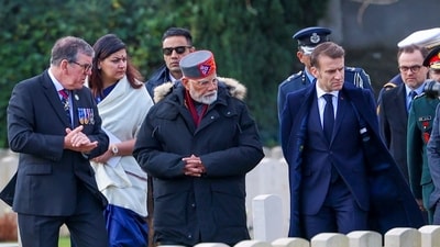 Marseille: In this image provided by PMO, Prime Minister Narendra Modi and French President Emmanuel Macron at the Mazargues Cemetery to pay tribute to the fallen heroes. (PMO/PTI) Marseille: In this image provided by PMO, Prime Minister Narendra Modi and French President Emmanuel Macron at the Mazargues Cemetery to pay tribute to the fallen heroes. (PMO/PTI)