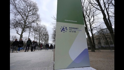 Police walk by a sign outside of the Grand Palais, which will be the venue for an upcoming AI Action Summit, in Paris, Sunday, Feb. 9, 2025. (AP Photo/Michel Euler) (AP) Police walk by a sign outside of the Grand Palais, which will be the venue for an upcoming AI Action Summit, in Paris, Sunday, Feb. 9, 2025. (AP Photo/Michel Euler) (AP)
