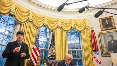 Elon Musk speaks as US President Donald Trump looks on in the Oval Office of the White House in Washington, DC, on February 11, 2025. Tech billionaire Elon Musk, who has been tapped by President Donald Trump to lead federal cost-cutting efforts, said the United States would go "bankrupt" without budget cuts. (AFP) Elon Musk speaks as US President Donald Trump looks on in the Oval Office of the White House in Washington, DC, on February 11, 2025. Tech billionaire Elon Musk, who has been tapped by President Donald Trump to lead federal cost-cutting efforts, said the United States would go "bankrupt" without budget cuts. (AFP)