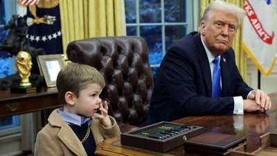 U.S. President Donald Trump looks on as X Æ A-12, Elon Musk's son, stands beside him in the Oval Office of the White House in Washington, D.C., U.S., February 11, 2025.   REUTERS/Kevin Lamarque     TPX IMAGES OF THE DAY (REUTERS)
