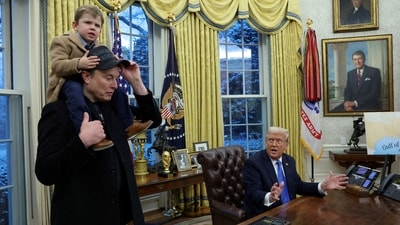 U.S. President Donald Trump speaks as Elon Musk carries X ? A-12 on his shoulders in the Oval Office of the White House in Washington, D.C., U.S.,&nbsp; (REUTERS)