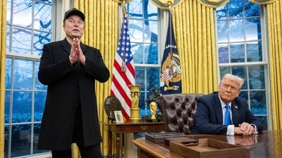 Elon Musk speaks as US President Donald Trump looks on in the Oval Office of the White House in Washington, DC, on February 11, 2025. (AFP) Elon Musk speaks as US President Donald Trump looks on in the Oval Office of the White House in Washington, DC, on February 11, 2025. (AFP)
