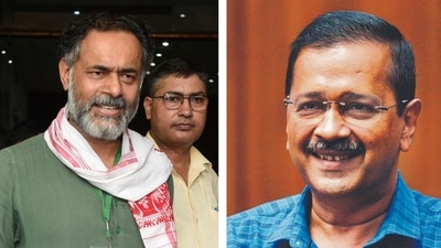 Swaraj India party co-founder Yogendra Yadav and AAP chief Arvind Kejriwal.