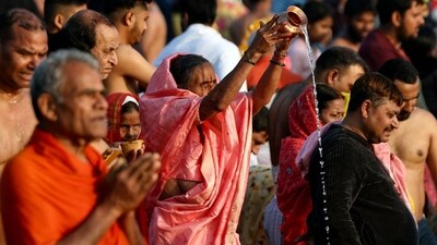 Pilgrims pray before taking a holy dip in Sangam, the confluence of Ganges, Yamuna and mythical Saraswati rivers, on the occasion of Maghi Purnima during the Maha Kumbh Mela festival in Prayagraj. (AFP) Pilgrims pray before taking a holy dip in Sangam, the confluence of Ganges, Yamuna and mythical Saraswati rivers, on the occasion of Maghi Purnima during the Maha Kumbh Mela festival in Prayagraj. (AFP)