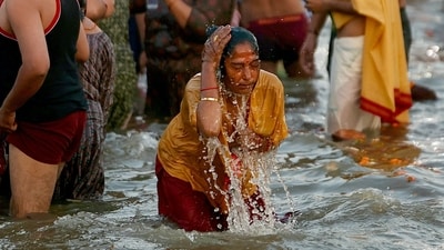 A pilgrim takes a holy dip in Sangam, the confluence of the Ganges, Yamuna and mythical Saraswati rivers, on the occasion of Maghi Purnima during the Maha Kumbh Mela festival in Prayagraj. (AFP) A pilgrim takes a holy dip in Sangam, the confluence of the Ganges, Yamuna and mythical Saraswati rivers, on the occasion of Maghi Purnima during the Maha Kumbh Mela festival in Prayagraj. (AFP)