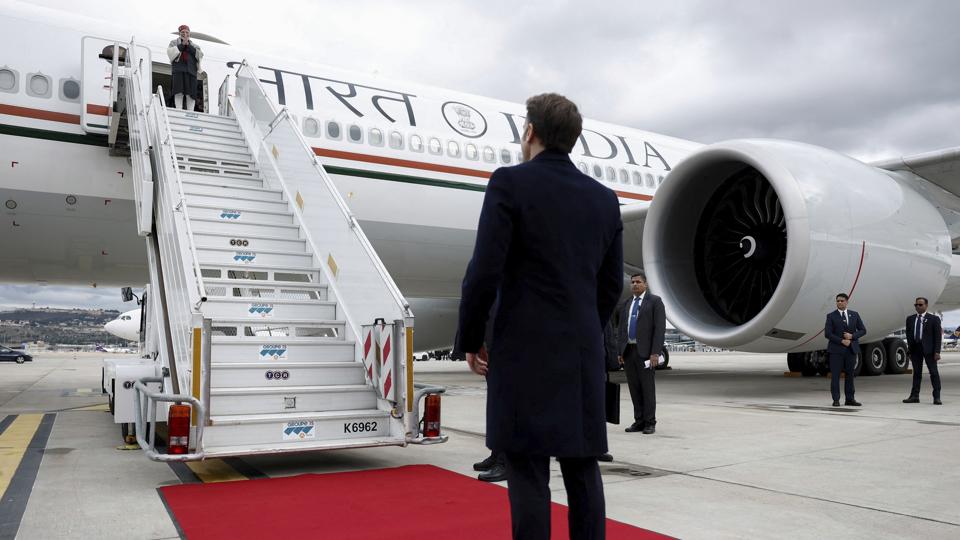 French President Emmanuel Macron looks on as Indian Prime Minister Narendra Modi boards a plane after a departure ceremony at Marseille Provence airport in Marignane (AP) French President Emmanuel Macron looks on as Indian Prime Minister Narendra Modi boards a plane after a departure ceremony at Marseille Provence airport in Marignane (AP)