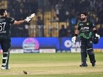 Pakistan's Salman Agha (L) celebrates after a century score (100 runs) as Mohammad Rizwan (R) looks on during the Tri-Nation series third one-day international (ODI) cricket match between Pakistan and South Africa at the National Stadium in Karachi on February 12, 2025. (Photo by Asif HASSAN / AFP) Pakistan's Salman Agha (L) celebrates after a century score (100 runs) as Mohammad Rizwan (R) looks on during the Tri-Nation series third one-day international (ODI) cricket match between Pakistan and South Africa at the National Stadium in Karachi on February 12, 2025. (Photo by Asif HASSAN / AFP)