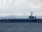Aircraft carrier USS Harry S. Truman is moored near Split, Croatia, Feb. 14, 2022. (AP Photo/Darko Bandic, File)