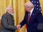 US President Donald Trump and Prime Minister Narendra Modi shake hands as they attend a joint press conference at the White House in Washington.