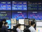 Asian stock markets followed Wall Street lower on Thursday after the Federal Reserve delivered another big interest rate hike to cool galloping inflation and raised its outlook for more. (AP Photo/Ahn Young-joon) Asian stock markets followed Wall Street lower on Thursday after the Federal Reserve delivered another big interest rate hike to cool galloping inflation and raised its outlook for more. (AP Photo/Ahn Young-joon)