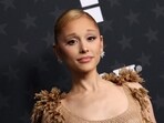 Ariana Grande's recent video with her Wicked co-stars sparked concern on Reddit as she appeared to be shaking. 
 (Photo by Michael Tran / AFP)