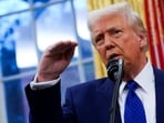 US President Donald Trump gestures in the Oval Office at the White House in Washington, D.C..
