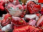 Valentine's Day balloons are displayed at a grocery store. (AP)
