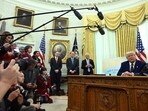 US President Donald Trump speaks in the Oval Office of the White House as he announces reciprocal tariffs, in Washington, DC, on February 13, 2025. US President Donald Trump speaks in the Oval Office of the White House as he announces reciprocal tariffs, in Washington, DC, on February 13, 2025.
