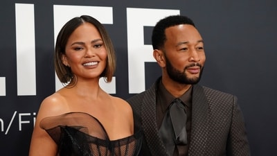 Chrissy Teigen, left, and John Legend arrive at the 67th annual Grammy Awards on Sunday, Feb. 2, 2025, in Los Angeles. (Photo by Jordan Strauss/Invision/AP) (Jordan Strauss/Invision/AP) Chrissy Teigen, left, and John Legend arrive at the 67th annual Grammy Awards on Sunday, Feb. 2, 2025, in Los Angeles. (Photo by Jordan Strauss/Invision/AP) (Jordan Strauss/Invision/AP)