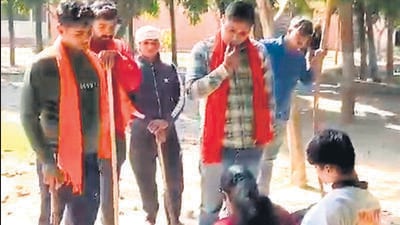 A video grab of the alleged incident. Vipin Gurjar Hindu, national president, Hindu Jagriti Manch, said the men in the videos taken from Swarn Jayanti Park in Indirapuram were from his organisation. (HT Photo) A video grab of the alleged incident. Vipin Gurjar Hindu, national president, Hindu Jagriti Manch, said the men in the videos taken from Swarn Jayanti Park in Indirapuram were from his organisation. (HT Photo)