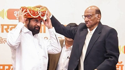 Maharashtra Deputy Chief Minister Eknath Shinde being honored with 'Mahadji Shinde Rashtra Gaurav Puraskar' by Nationalist Congress Party-Sharadchandra Pawar (NCP-SP) Chief Sharad Pawar, at New Maharashtra Sadan in New Delhi on Tuesday. (Eknath Shinde - X) Maharashtra Deputy Chief Minister Eknath Shinde being honored with 'Mahadji Shinde Rashtra Gaurav Puraskar' by Nationalist Congress Party-Sharadchandra Pawar (NCP-SP) Chief Sharad Pawar, at New Maharashtra Sadan in New Delhi on Tuesday. (Eknath Shinde - X)