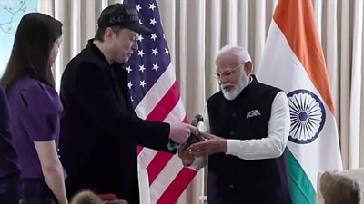 Washington, DC, Feb 13 (ANI): Prime Minister Narendra Modi and Tesla CEO Elon Musk during a bilateral meeting at Blair House, in Washington, DC on Thursday. (ANI Photo) (ANI Grab)
