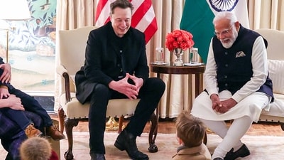 Washington, DC, Feb 13 (ANI): Prime Minister Narendra Modi interacts with Tesla CEO Elon Musk's son son X Æ A-12 during a bilateral meeting at Blair House, in Washington, DC on Thursday. (ANI Photo) (narendramodi-X)