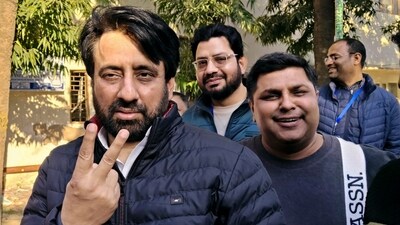 AAP's Amanatullah Khan shows victory sign after winning his seat in the Delhi Assembly election, in New Delhi, Saturday, Feb. 8, 2025. (PTI) AAP's Amanatullah Khan shows victory sign after winning his seat in the Delhi Assembly election, in New Delhi, Saturday, Feb. 8, 2025. (PTI)