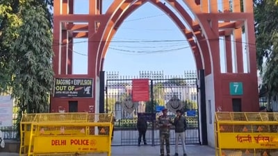 Security personnel deployed outside the Jamia Millia Islamia University given students' protest in New Delhi. (PTI) Security personnel deployed outside the Jamia Millia Islamia University given students' protest in New Delhi. (PTI)