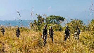 Police and security personnel during a search operation in the fringe and vulnerable areas of hill and valley districts of Manipur. (PTI) Police and security personnel during a search operation in the fringe and vulnerable areas of hill and valley districts of Manipur. (PTI)