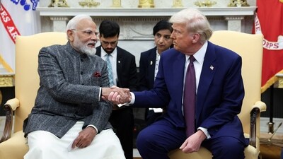 US President Donald Trump and Prime Minister Narendra Modi shake hands, at the White House in Washington, D.C. (REUTERS)