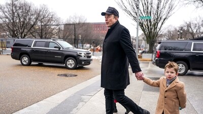 Elon Musk walks with his son X Æ A-12, on the day he meets with Indian Prime Minister Narendra Modi at Blair House, in Washington, D.C., U.S., February 13, 2025. REUTERS/Nathan Howard (REUTERS)