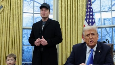 US President Donald Trump speaks next to Elon Musk and X Æ A-12, Musk's son, in the Oval Office of the White House in Washington. (REUTERS)