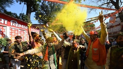 BJP supporters celebrate the Delhi election results on February 8. (Arvind Yadav/ HT Photo) BJP supporters celebrate the Delhi election results on February 8. (Arvind Yadav/ HT Photo)