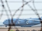 A US Air Force C-17 Globemaster III aircraft carrying Indian migrants at Sri Guru Ram Dass Jee International Airport in Amritsar on February 5. A US Air Force C-17 Globemaster III aircraft carrying Indian migrants at Sri Guru Ram Dass Jee International Airport in Amritsar on February 5.