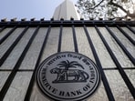 The Reserve Bank of India (RBI) seal is pictured on a gate outside the RBI headquarters in Mumbai.